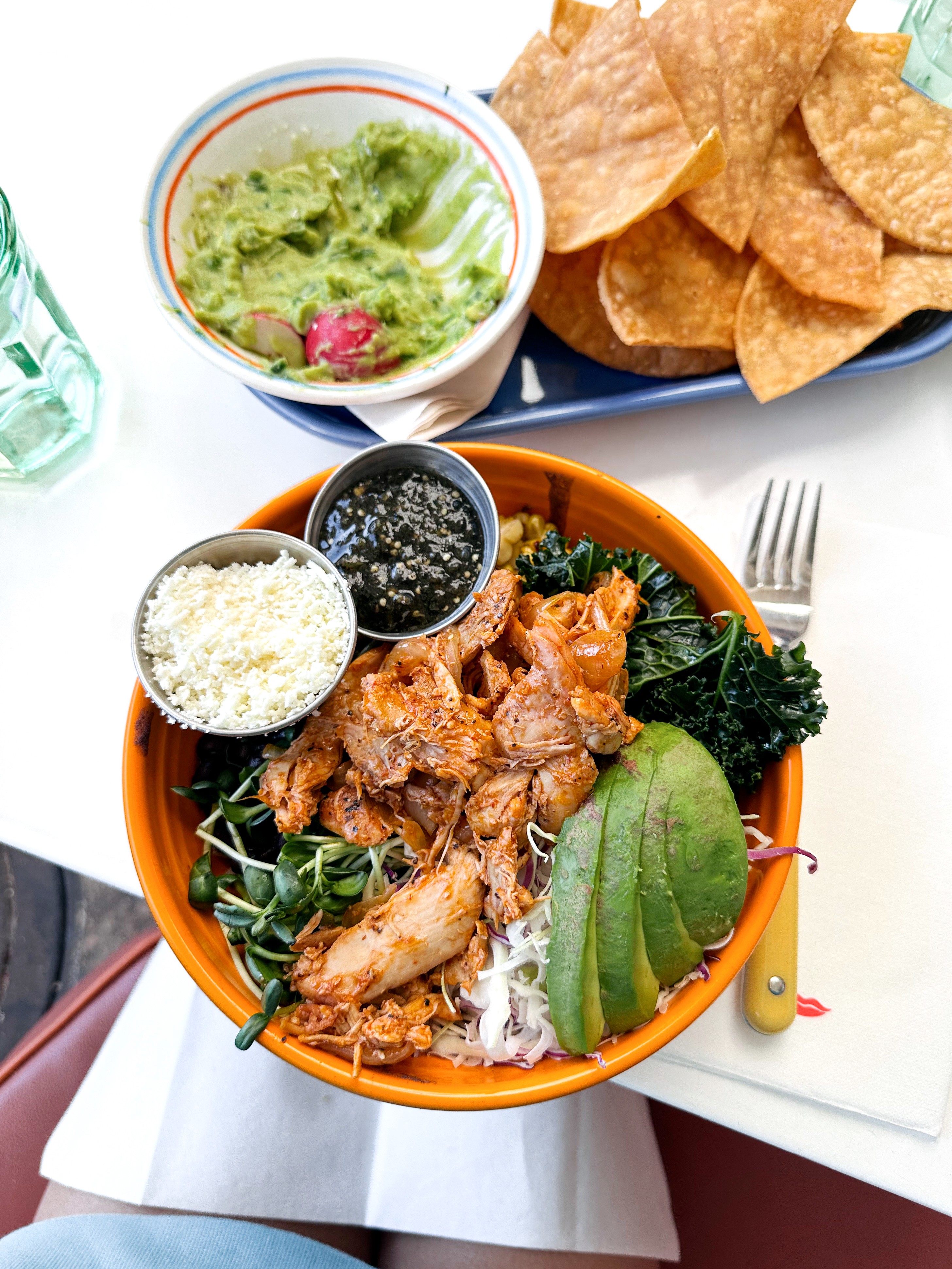 Chips, guacamole, and a loaded bowl